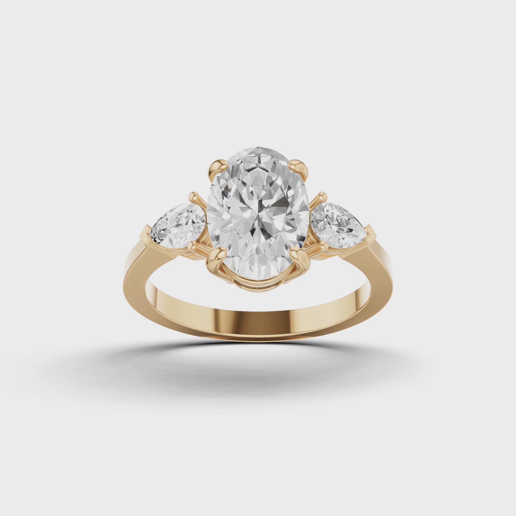 Oval & Pear Three Stone Ring