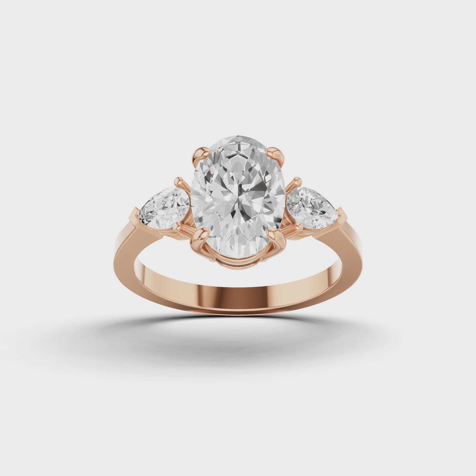 Oval & Pear Three Stone Ring